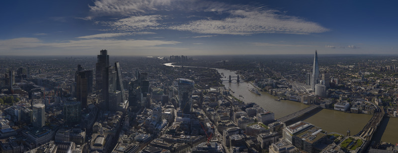 Aerial view of The Fenchurch Building and The Walkie Talkie with the London skyline River Thames Tower Bridge and The Shard London England United Kingdom. Aerial view of The Fenchurch Building and The Walkie Talkie with the London skyline River Thames Tower Bridge and The Shard London England United Kingdom.