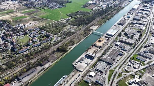Aerial view of canal and industrial area France.