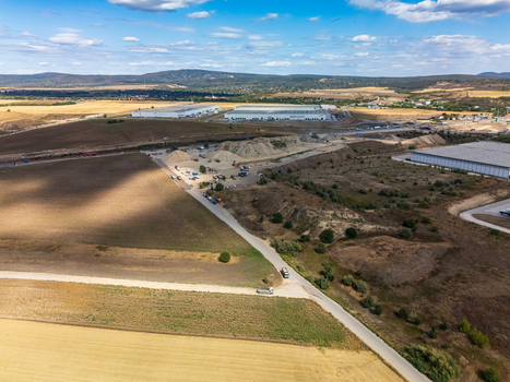Aerial view of M1 widening near Paty with lane closure and machinery nearby Aerial view of M1 widening near Paty with lane closure and machinery nearby