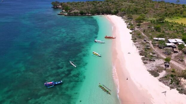 Aerial view of Pink Beach and turquoise water Indonesia. Aerial view of Pink Beach and turquoise water Indonesia.