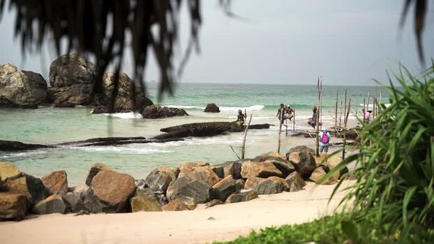 View of stilt fishermen on the coast of Koggala Sri Lanka. View of stilt fishermen on the coast of Koggala Sri Lanka.