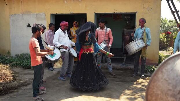 View of people dancing to traditional music in Dang Nepal.