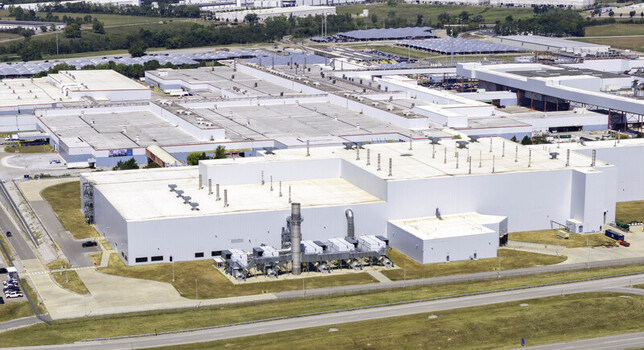Aerial view of the General Motors Spring Hill Manufacturing facility showing the industrial HVAC system on the factory roof surrounded by paved lots in Nashville TN United States. Aerial view of the General Motors Spring Hill Manufacturing facility showing the industrial HVAC system on the factory roof surrounded by paved lots in Nashville TN United States.