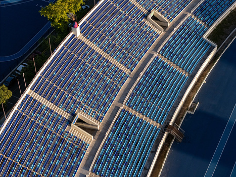 Aerial view of the blue stadium seating and running track in Santo Domingo Distrito Nacional Dominican Republic.