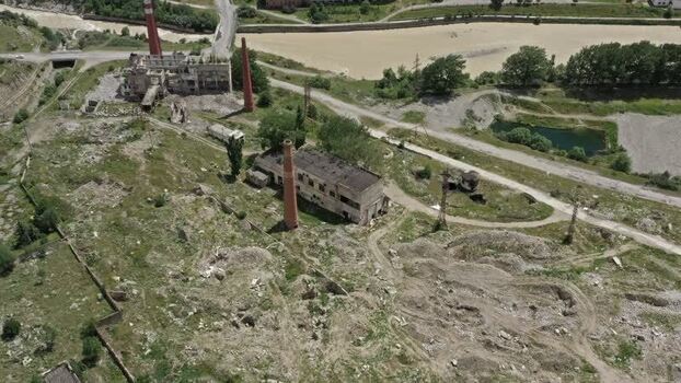 Aerial view of abandoned factory in Caucasus Mountains Russia.