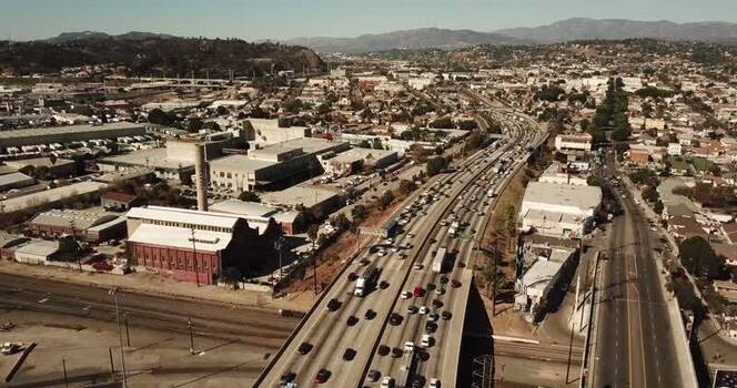 Aerial view of heavy traffic on a freeway in Los Angeles United States. Aerial view of heavy traffic on a freeway in Los Angeles United States.