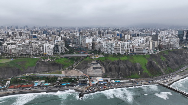 Aerial view of the coastal cliffs and urban skyline of Miraflores and Barranco overlooking the Pacific Ocean in Barranco Provincia de Lima Peru. Aerial view of the coastal cliffs and urban skyline of Miraflores and Barranco overlooking the Pacific Ocean in Barranco Provincia de Lima Peru.