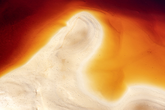 View of the abstract textures of the Rio Tinto river with its characteristic red acidic water and white mineral deposits in Minas de Riotinto Andalusia Spain. View of the abstract textures of the Rio Tinto river with its characteristic red acidic water and white mineral deposits in Minas de Riotinto Andalusia Spain.