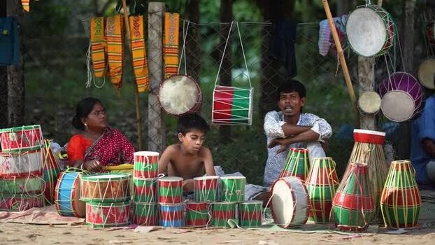 View of people selling traditional colorful drums in Bogura Bangladesh.