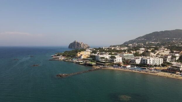 Aerial view of the coastline and Aragonese Castle in Ischia Italy. Aerial view of the coastline and Aragonese Castle in Ischia Italy.