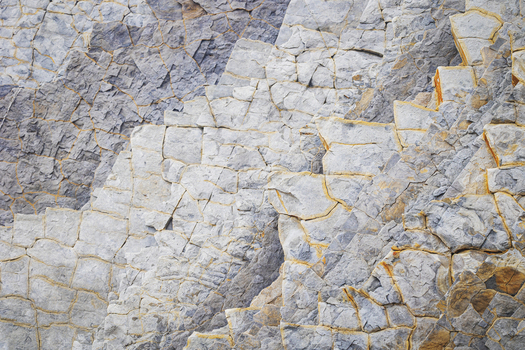 View of the unique geological rock formations and textured stone layers at Playa de Sopelana in Vizcaya Pais Vasco Spain. View of the unique geological rock formations and textured stone layers at Playa de Sopelana in Vizcaya Pais Vasco Spain.