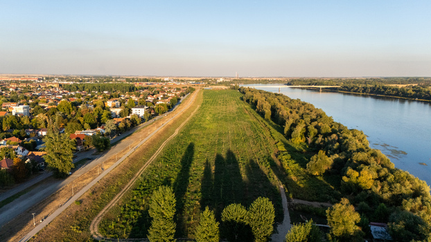Aerial view of the Sava river a bridge and the urban landscape in Sremska Mitrovica Vojvodina Serbia. Aerial view of the Sava river a bridge and the urban landscape in Sremska Mitrovica Vojvodina Serbia.