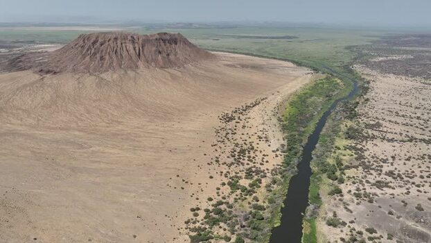 Aerial view of Danakil Desert crater and river Ethiopia. Aerial view of Danakil Desert crater and river Ethiopia.