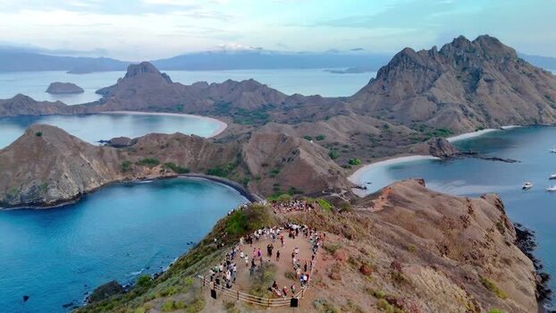 Aerial view of Komodo National Park with tourists on Padar Island Indonesia. Aerial view of Komodo National Park with tourists on Padar Island Indonesia.