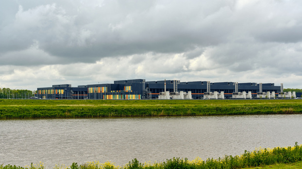 Middenmeer Netherlands 17 May 2026 View of the Microsoft Datacenter Western Europe at Agriport with its colorful facade panels behind a canal under a cloudy sky. Middenmeer Netherlands 17 May 2026 View of the Microsoft Datacenter Western Europe at Agriport with its colorful facade panels behind a canal under a cloudy sky.