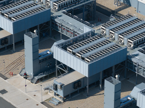 Aerial view of datacenter with industrial cooling units and metal infrastructure The Netherlands. Aerial view of datacenter with industrial cooling units and metal infrastructure The Netherlands.