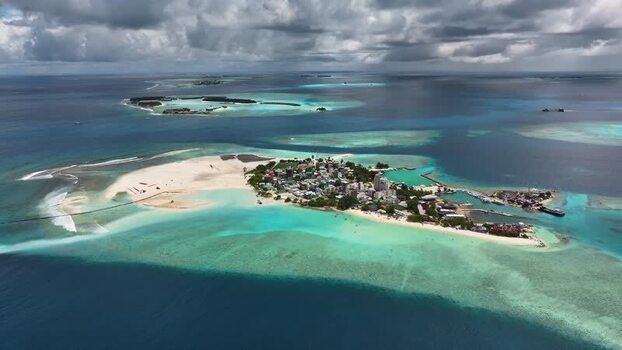 Aerial view of Gulhi island with turquoise lagoons and white sand Maldives. Aerial view of Gulhi island with turquoise lagoons and white sand Maldives.