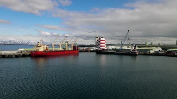 Aerial view of cargo ships and industrial port in Hafnarfjordur Iceland.