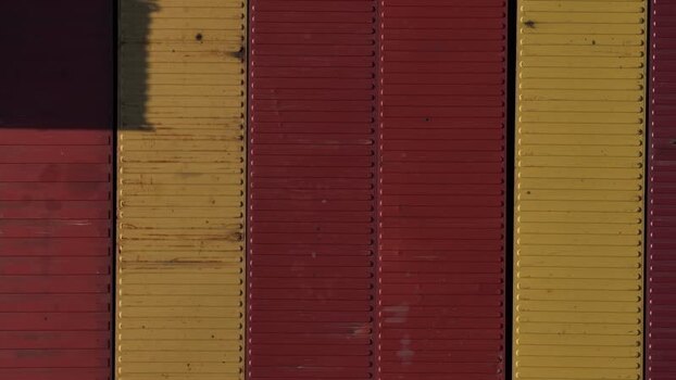 Aerial view of red and yellow shipping containers Portugal.