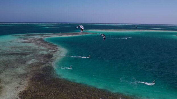 Aerial view of kiteboarders in Los Roques archipelago Venezuela.