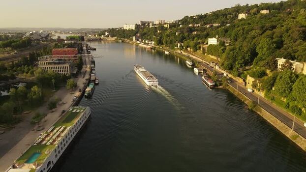 Aerial view of a barge cruising on the river in Nevers France. Aerial view of a barge cruising on the river in Nevers France.