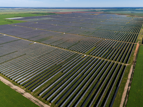 Aerial view of Limondale Solar Farm with rows of photovoltaic panels stretching across the landscape in Balranald New South Wales Australia. Aerial view of Limondale Solar Farm with rows of photovoltaic panels stretching across the landscape in Balranald New South Wales Australia.