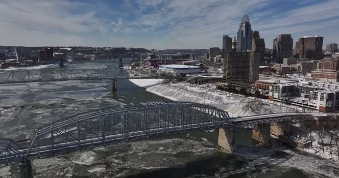 Aerial view of the Cincinnati skyline and icy Ohio River United States. Aerial view of the Cincinnati skyline and icy Ohio River United States.