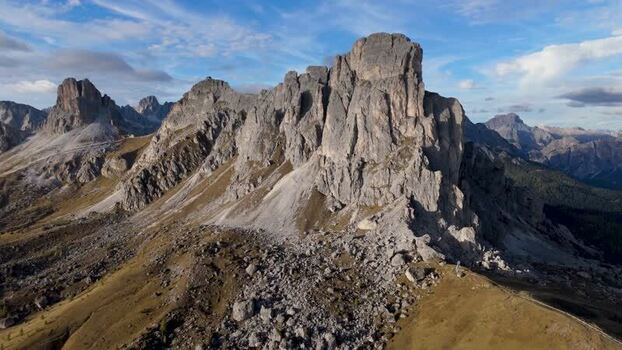 Aerial view of Passo Giau and the jagged Dolomite peaks Italy.