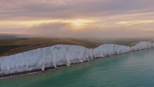 Aerial view of Seven Sisters Cliffs at sunset United Kingdom. Aerial view of Seven Sisters Cliffs at sunset United Kingdom.