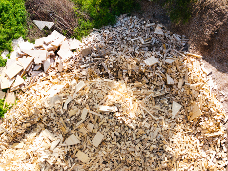Aerial view of a large pile of wood scraps and lumber offcuts in a timber processing area in Salgale parish Jelgava Municipality Latvia. Aerial view of a large pile of wood scraps and lumber offcuts in a timber processing area in Salgale parish Jelgava Municipality Latvia.