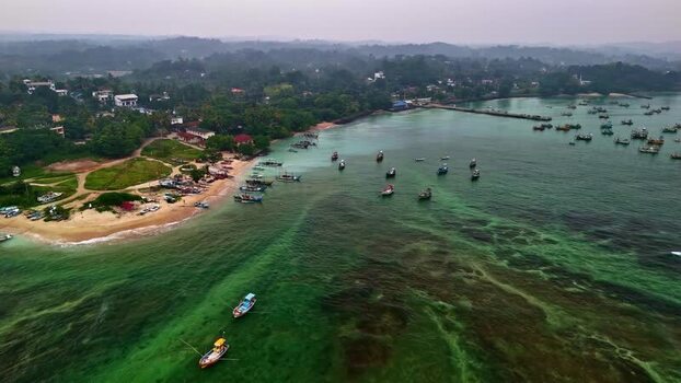 Aerial view of fishing boats in a coastal bay Sri Lanka.