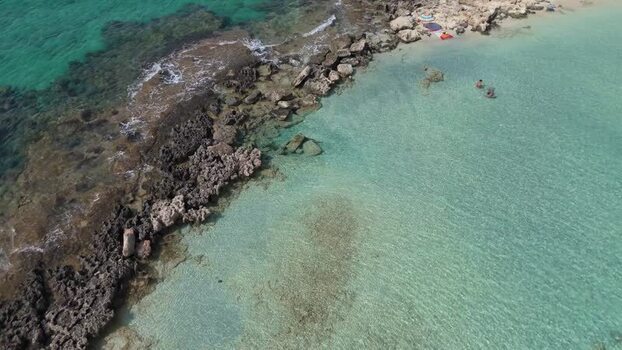 Aerial view of rocky coastline and turquoise water Northern Cyprus.