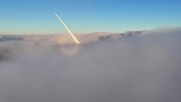 Aerial view of a wind turbine blade above clouds Austria. Aerial view of a wind turbine blade above clouds Austria.