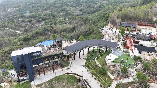 Kecamatan Purwosari Daerah Istimewa Yogya Indonesia 23 November 2023 Aerial view of Obelix Sea View featuring a modern restaurant swimming pool curved bridge and terraced gardens. Kecamatan Purwosari Daerah Istimewa Yogya Indonesia 23 November 2023 Aerial view of Obelix Sea View featuring a modern restaurant swimming pool curved bridge and terraced gardens.