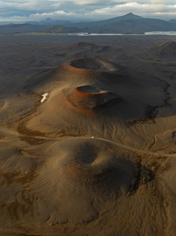 Aerial view of Landmannalaugar volcanic craters with rugged lava fields and dramatic mountain landscape in Rangarthing ytra Iceland. Aerial view of Landmannalaugar volcanic craters with rugged lava fields and dramatic mountain landscape in Rangarthing ytra Iceland.