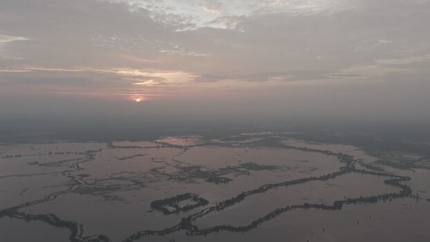 Aerial view of Gumai Beel at sunset in Bangladesh.