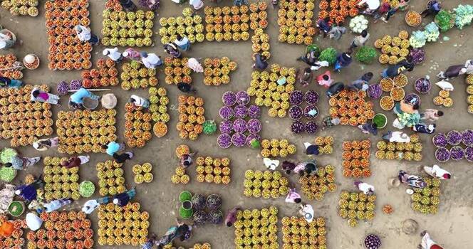 Aerial view of a vibrant vegetable market in Bangladesh.