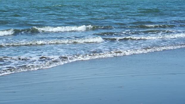 View of waves crashing on the beach Bangladesh