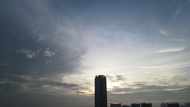 Aerial view of a skyscraper silhouette at sunset Indonesia. Aerial view of a skyscraper silhouette at sunset Indonesia.