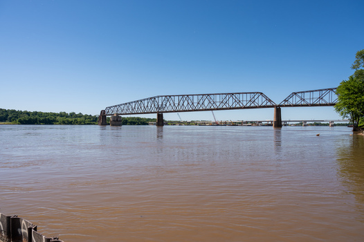 View of the historic Old Chain of Rocks Bridge spanning the Mississippi River under a clear blue sky in St. Louis Missouri United States. View of the historic Old Chain of Rocks Bridge spanning the Mississippi River under a clear blue sky in St. Louis Missouri United States.
