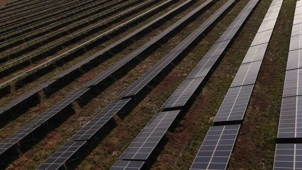Aerial view of solar panels in a solar farm Portugal. Aerial view of solar panels in a solar farm Portugal.