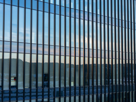 Aerial view of the modern glass facade of a building in Gdansk Poland. Aerial view of the modern glass facade of a building in Gdansk Poland.