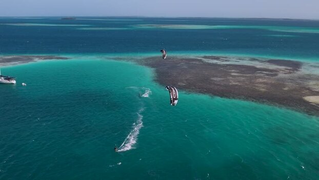 Aerial view of kiteboarders in Los Roques archipelago Venezuela.