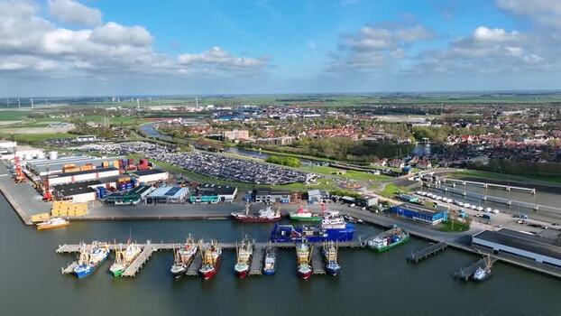 Aerial view of fishing boats in the harbor Harlingen Netherlands.