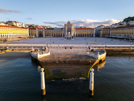 Aerial view of Praca do Comercio featuring the Rua Augusta Arch and Cais das Colunas by the Tagus river in Lisbon Lisbon Portugal. Aerial view of Praca do Comercio featuring the Rua Augusta Arch and Cais das Colunas by the Tagus river in Lisbon Lisbon Portugal.