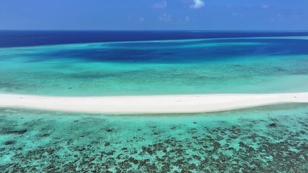 Aerial view of a white sandbank and turquoise lagoon Maldives. Aerial view of a white sandbank and turquoise lagoon Maldives.