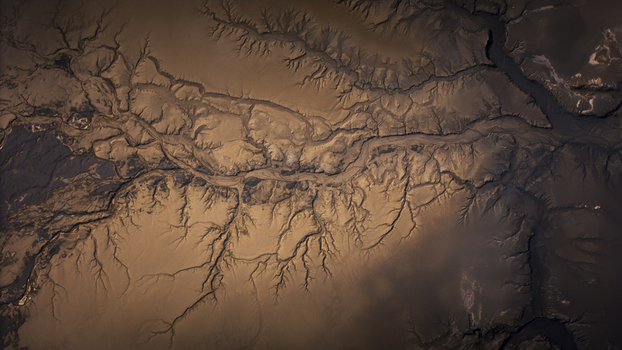 Aerial view of the intricate braided river channels and dark volcanic sediment patterns of the Langisjor landscape in Vik Myrdalshreppur Iceland. Aerial view of the intricate braided river channels and dark volcanic sediment patterns of the Langisjor landscape in Vik Myrdalshreppur Iceland.