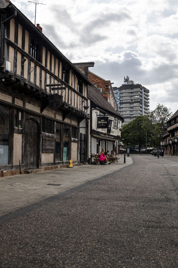 Coventry United Kingdom 20 July 2026 View of the historic Old Windmill pub with its timber framed facade and people sitting at outdoor tables on a quiet street.