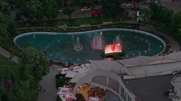 Aerial view of an illuminated fountain in a park Albania.