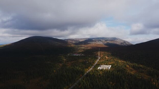 Aerial view of Ounastunturi mountains and winding road Finland. Aerial view of Ounastunturi mountains and winding road Finland.